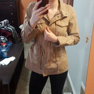 Tan jacket with drawstring